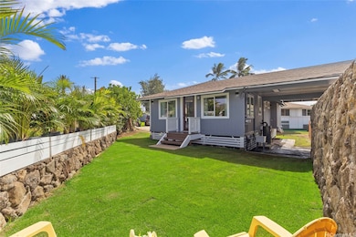 Private backyard is perfect for an evening BBQ or family games