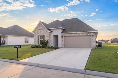 Large driveway that can comfortably fit 2 cars.