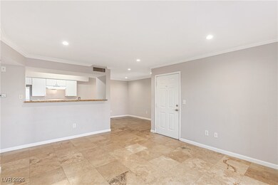 Unfurnished room with crown molding, recessed ligh