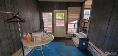 Enclosed breezeway.