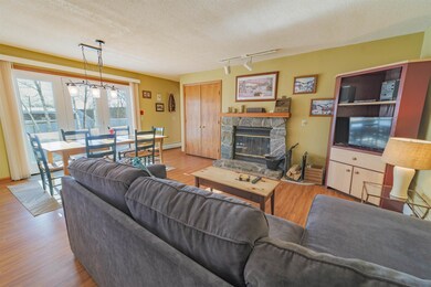 Fieldstone fireplace and open concept living