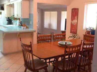 Palmer dining area off of kitchen and Ar