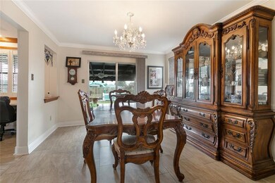 Dining room leads to kitchen and back yard.