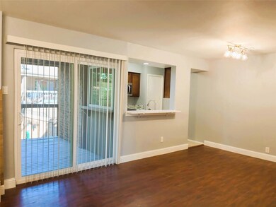 Unfurnished room with an inviting chandelier and d