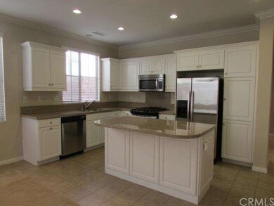 Beautiful clean kitchen with stainless appliances.