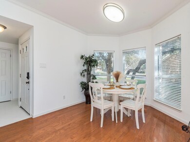 Dining room featuring crown molding, wood finishe