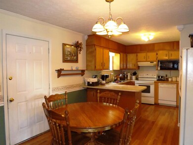 Beautiful Kitchen, and Dinning Room...Gleaming Hardwood Flooring