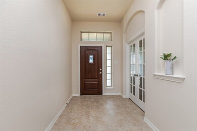 Double french doors to your study or formal dining.