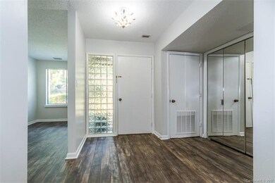 Entrance with New Flooring and Fixtures.