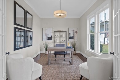 Office with dark hardwood / wood-style flooring, o