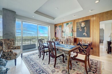 Custom ceiling details offer a defined dining spac