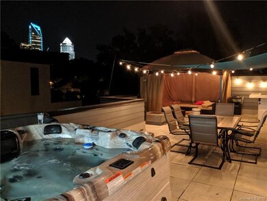 Rooftop picture shows similar unit to give buyer i