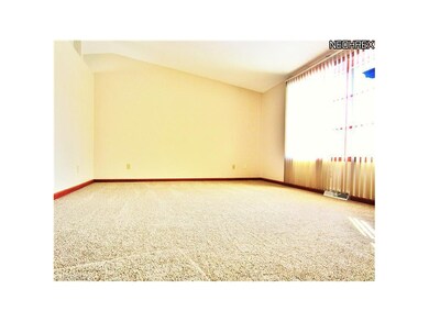 Neutral living room with brand new carpet & vaulte