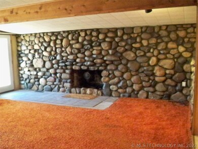 Full wall stone fireplace