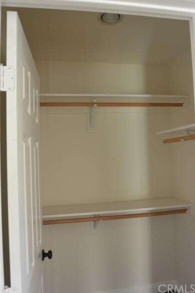 Walk-in closet in Master Suite with LED recess lig