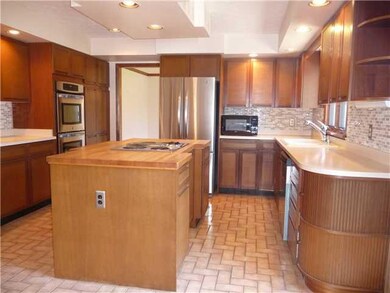 Exterior Front. The kitchen is expansive, with an 