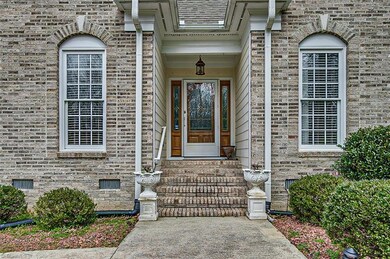 Exterior front, concrete walkway