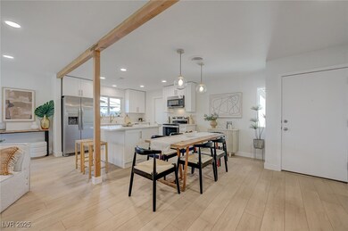 Dining space with baseboards, recessed lighting, a