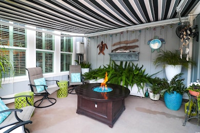 View of patio / terrace with a fire pit