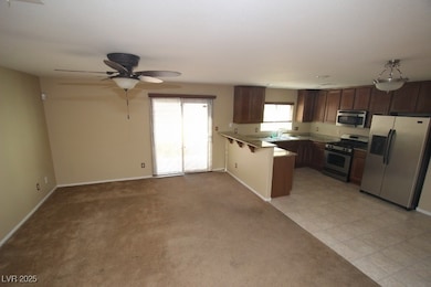 Kitchen with appliances with stainless steel finis