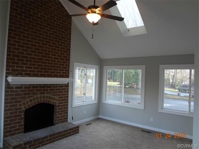 Florida room with vaulted ceiling, ceiling fan, an