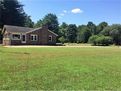 Here's an Alternate View of Side of Home and Drive