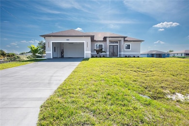 3115 2nd St SW, Lehigh Acres, FL 33976 - photo 2