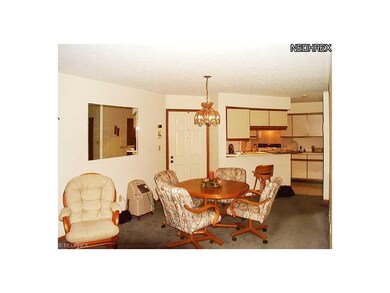 A view from the living room showing the dining are