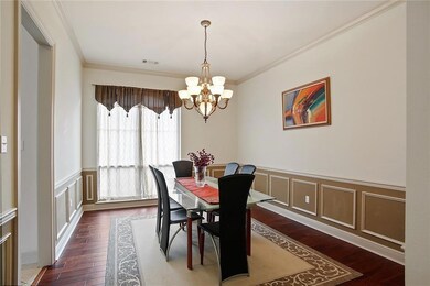 Formal Dining with double window, chandelier, crow
