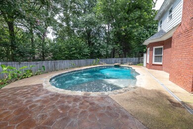 View of pool with a fenced backyard and a patio area