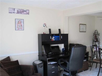 Living Room. Current owners have their computer ar