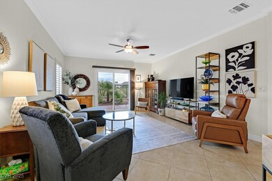 Great room is light and bright with sliding glass door to patio and backyard views!