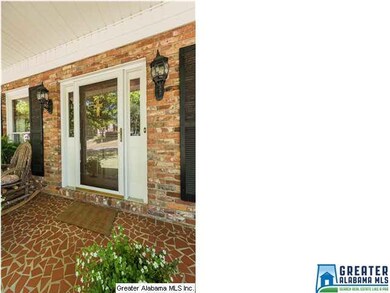 Lovely Front Porch with beautiful tile and maintai