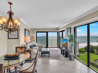 Living room. Impact glass & shutters  throughout.