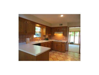 Enjoy gas range, solid surface counters.