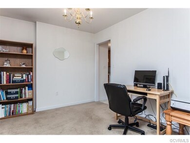 Formal dining room with chandelier. This can also 