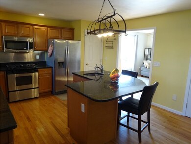 Kitchen with Island looking into formal dining are