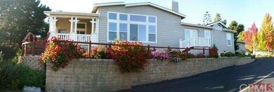 Notice the beautiful landscaping and retaining wal