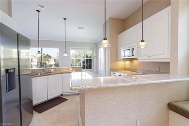 Kitchen withn living room and lake view