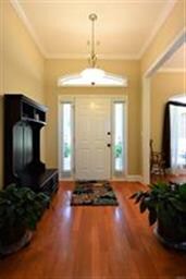 WOOD FLOOR ENTRY OPEN TO DINING ROOM ON RIGHT