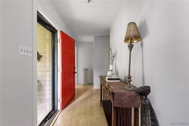 Corridor featuring hardwood / wood-style flooring