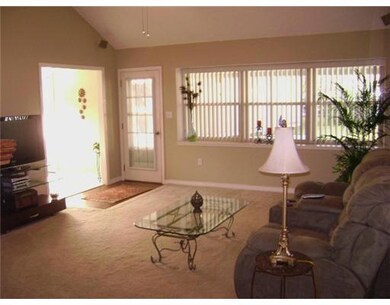 Den/Family/Great Room. High ceiling, wall of windo
