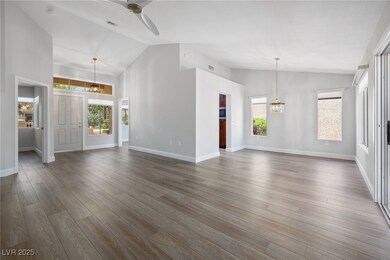 View from living room towards foyer and dining roo