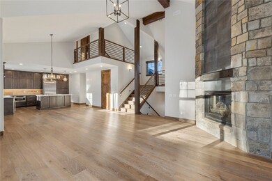 Gorgeous rock fireplace to cozy up by on a snowy d