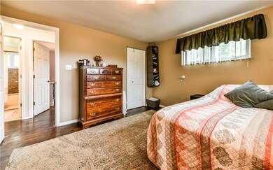 Master Bedroom offers Hardwood Floors, two windows
