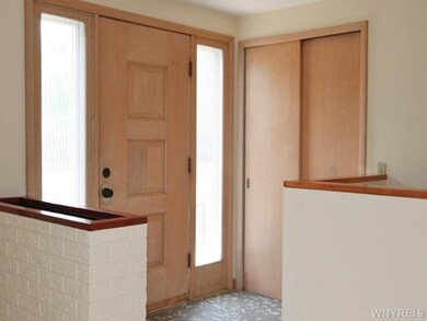 Foyer Windows on both sides for the front door whi