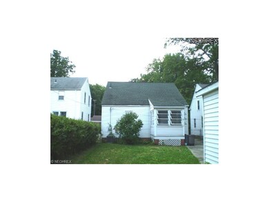 The enclosed rear porch is off a downstairs bedroom.
