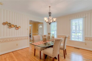Dining Room with newly refinished hardwood.