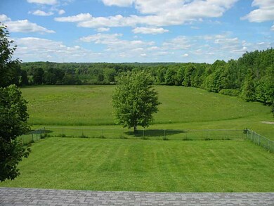 View. Back view off upper porch! Large fenced area