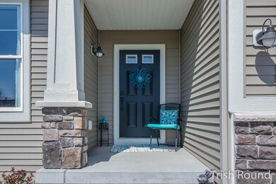 7743 Carliele Crossings Blvd SW unit 2, Byron Center, MI 49315 - photo 2